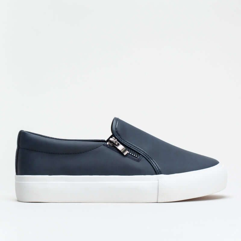 Women's Unreal Slip On Sneaker 163176 with synthetic upper and side zip detail for easy wear.